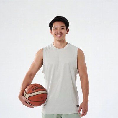 Asian man holding basketball