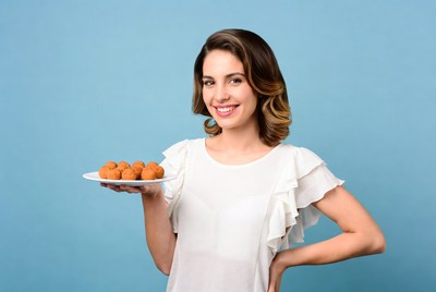 Woman holding fried food platter