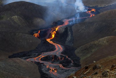 Lava Flowing Down Volcanic Mountainside