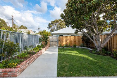 Backyard with Paved Path and Garden