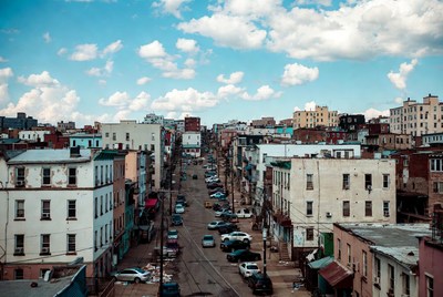 Urban Street with Row Houses and Cars