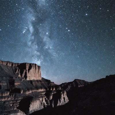 Milky Way over canyon cliffs