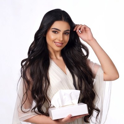 Woman holding tissue box