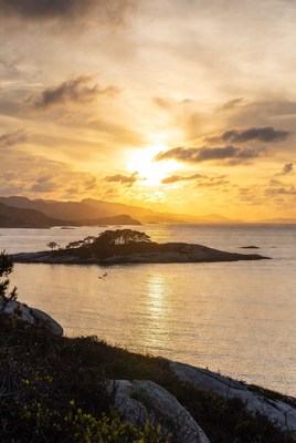 Sunset over island and sea