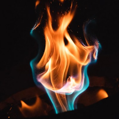 Blue and orange flames burning