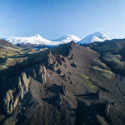 Snow-Capped Mountains and Volcanic Landscape