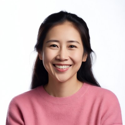 Smiling Asian woman in pink sweater