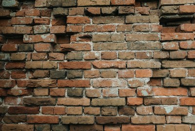 Old weathered brick wall texture