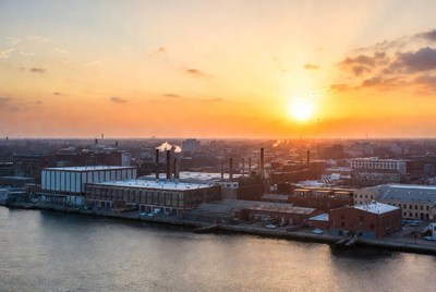 Industrial Complex at Sunset by River