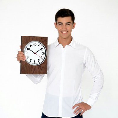 Young man holding wooden clock