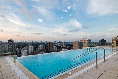 Infinity Pool Overlooking City Skyline