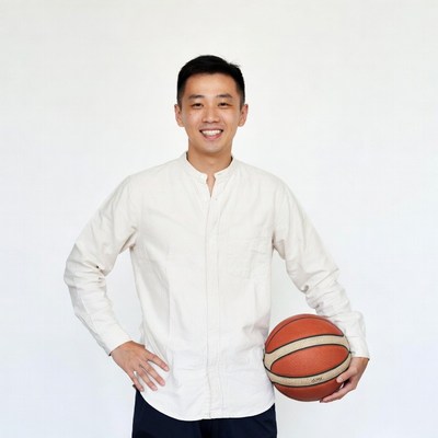 Asian man holding basketball