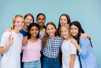 Group of diverse girls hugging