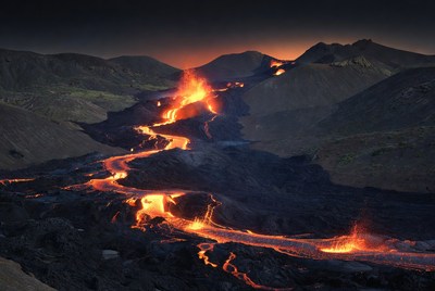 Lava Flowing Down Volcanic Mountains