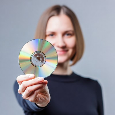 Woman holding CD disc