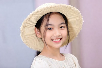 Asian girl wearing straw hat