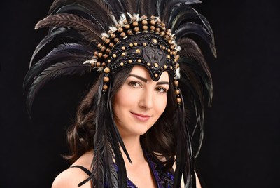 Woman wearing feathered headdress