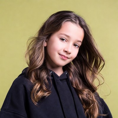 Smiling girl in black hoodie