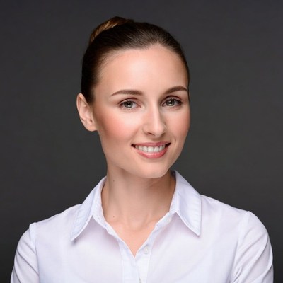 Smiling woman in white shirt