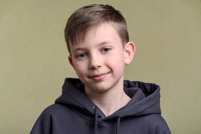 Boy smiling in hoodie