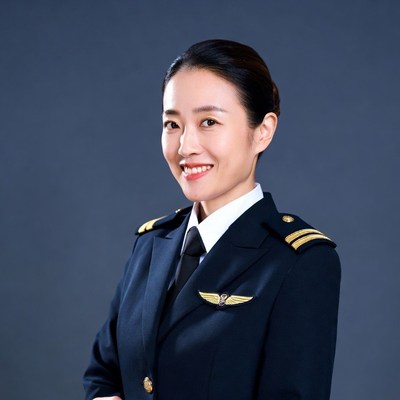 Asian woman in pilot uniform