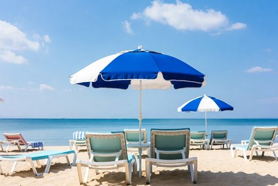 Beach umbrellas and lounge chairs