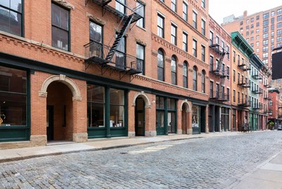 Brick Brownstone Buildings on Cobblestone Street