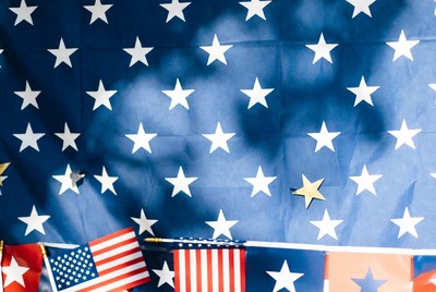 American Flags on Starry Blue Background
