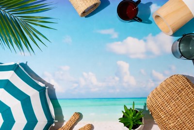 Beach vacation flat lay with umbrella