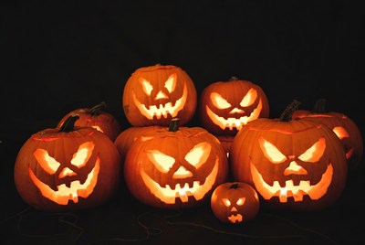 Group of carved jack-o-lantern pumpkins