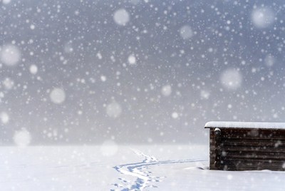 Snowy Wooden Cabin Footprints