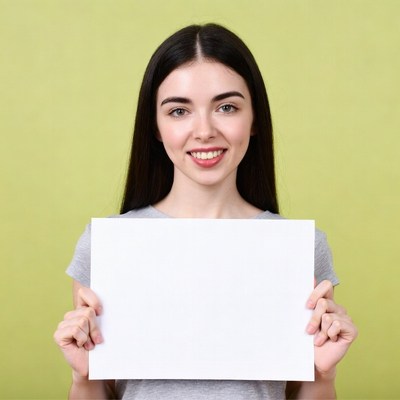 Woman holding blank sign