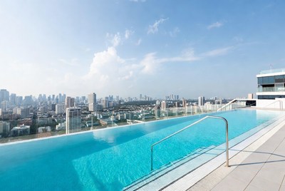 Infinity Pool Overlooking City Skyline