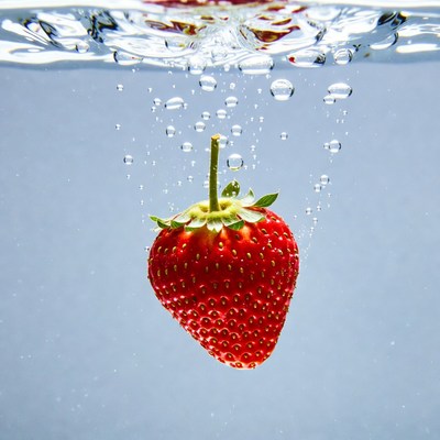 Strawberry submerged in water
