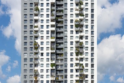 High-rise building with balcony plants