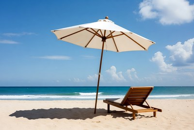 White Umbrella and Wooden Lounge Chair on Beach