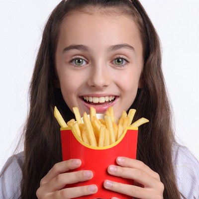 Girl holding french fries box