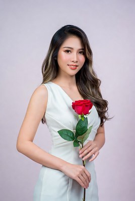 Asian woman holding red rose