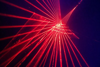 Red laser beams forming pyramid