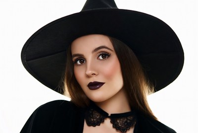 Woman wearing witch hat