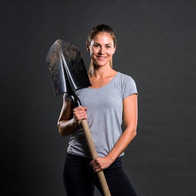 Woman holding shovel