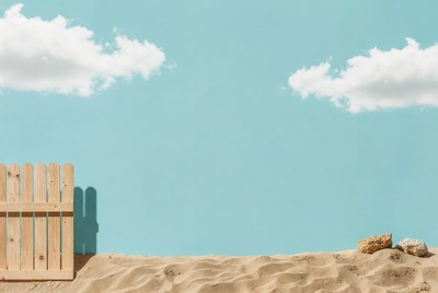 Wooden picket fence on beach