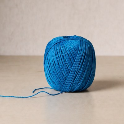 Blue yarn ball on table