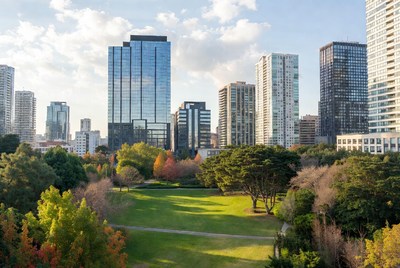 Autumn Park with City Skyline