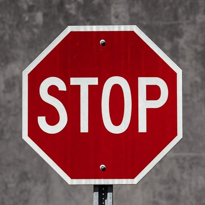 Red Stop Sign on Pole