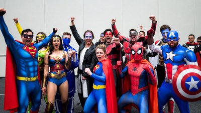 Group of Superhero Cosplayers Posing Together