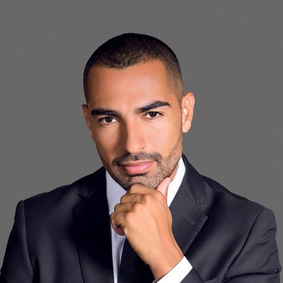 Man in suit touching chin