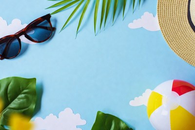 Beach items on blue background