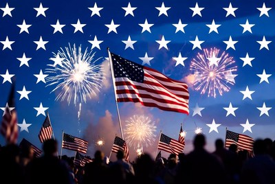 Crowd watching fireworks with American flags