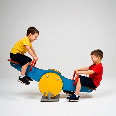 Two boys playing on seesaw